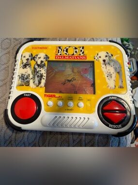 101 Dalmatians Electronic Handheld Game by Tiger - 1994